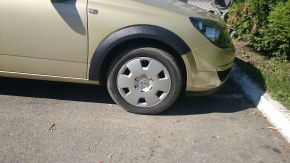 Protector plástico paso de rueda para Opel Astra III (H) hatchback (2004-2014), versión de 5 puertas