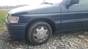 Protector plástico paso de rueda para Ford Escort MK VII (1995-2002), versión de 3 puertas